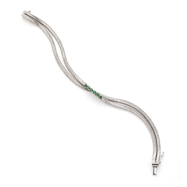 Gold bracelet with emeralds