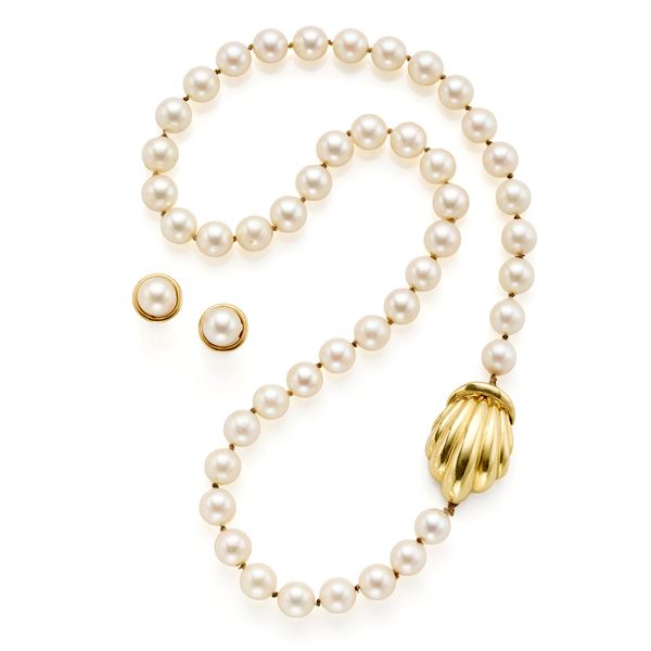 Gold and pearls demi parure consisting of earrings and necklace