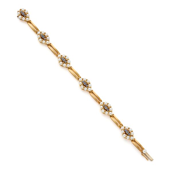 Gold bracelet with micro pearls and gemstones