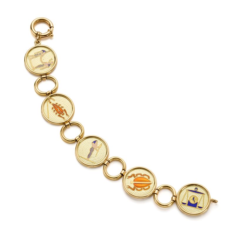 Bracciale modulare in oro giallo 18 Kt con decorazioni a soggetto egizio