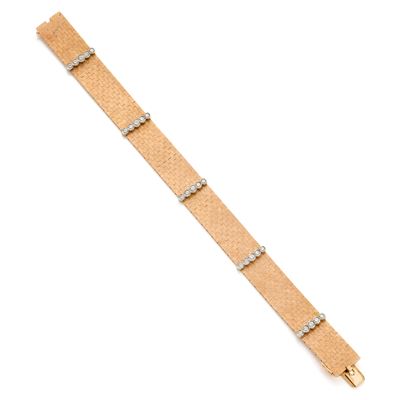 Bracciale in oro giallo e bianco 18 Kt con diamanti rotondi, circa 1,10 ct