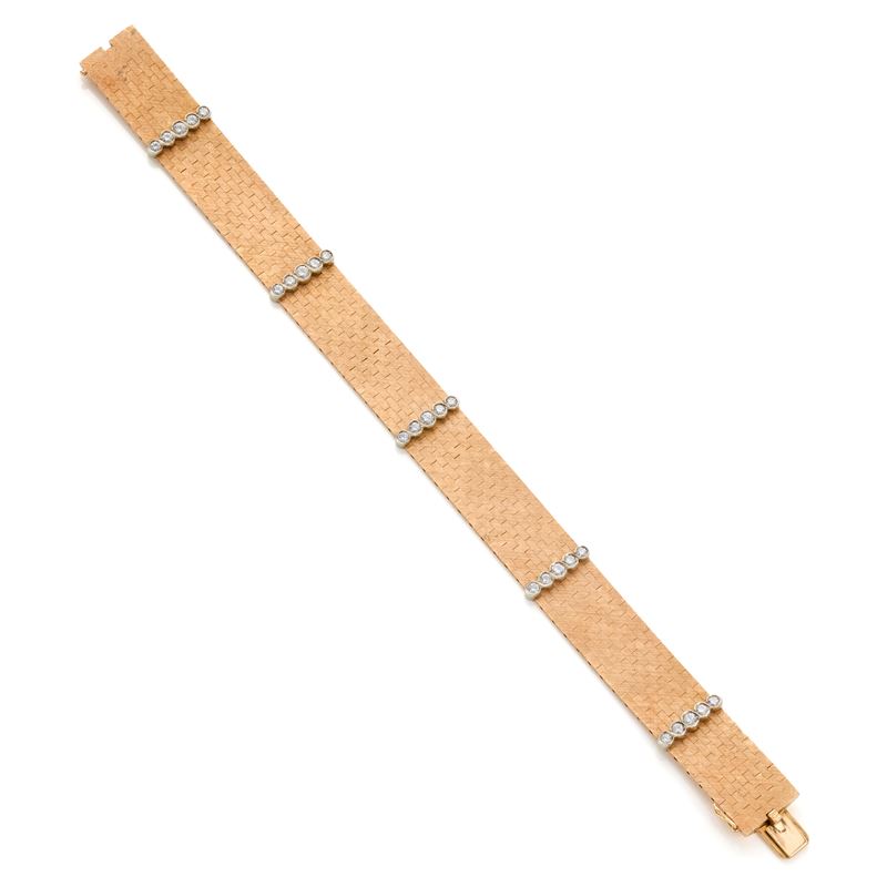 Bracciale in oro giallo e bianco 18 Kt con diamanti rotondi, circa 1,10 ct