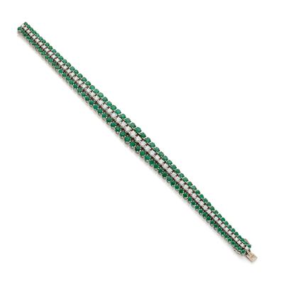 Bracciale in oro bianco 18 Kt con diamanti e smeraldi