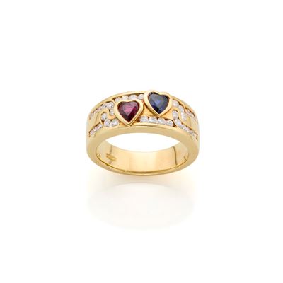 Anello in oro giallo 18 Kt con zaffiro e rubino a cuore e diamanti