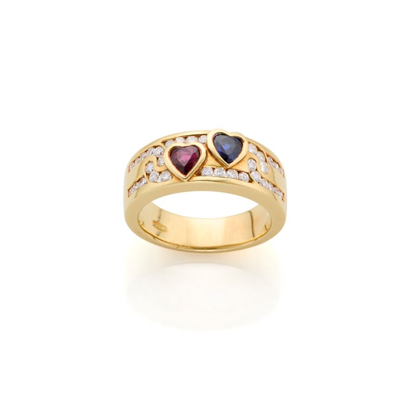 Anello in oro giallo 18 Kt con zaffiro e rubino a cuore e diamanti