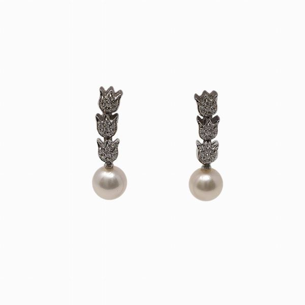 Orecchini oro bianco pendenti con perle