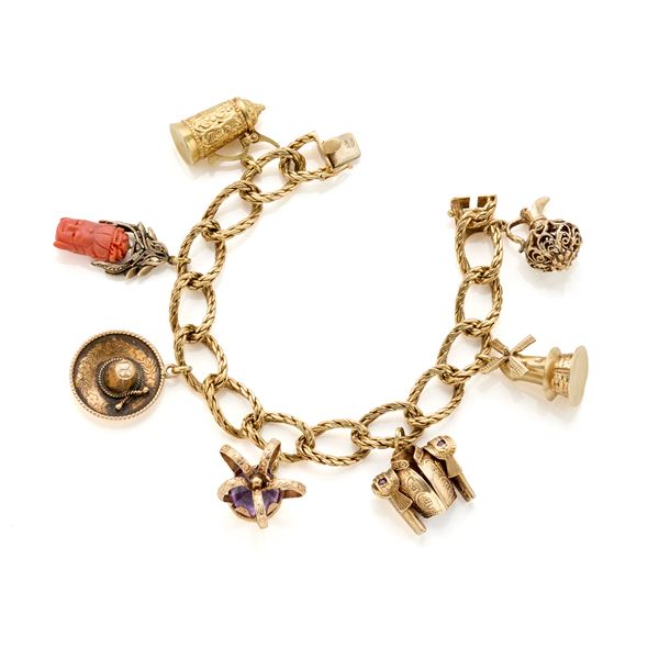 Gold bracelet with charms 