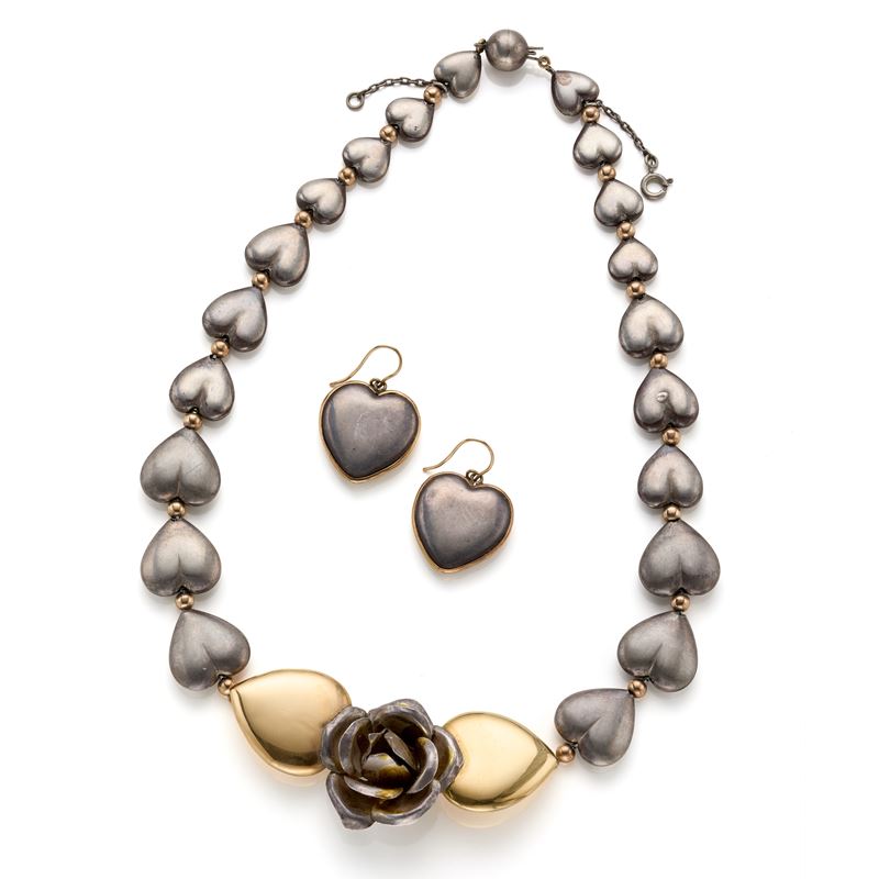 Demi parure in oro e argento