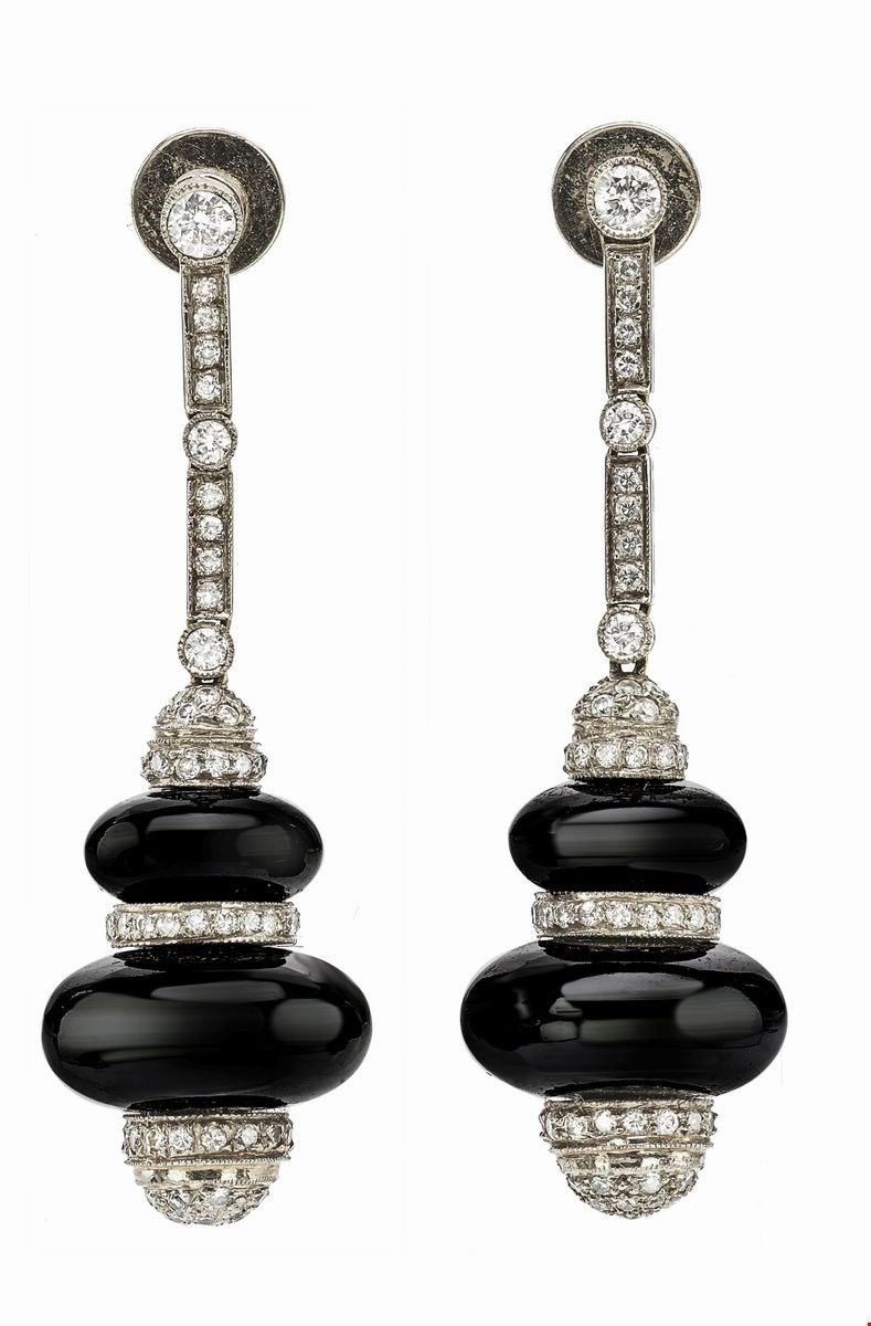 Orecchini in oro con diamanti e onice