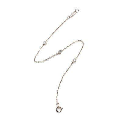 Tiffany & Co, Bracciale in platino con tre diamanti rotondi di circa 0,25 ct