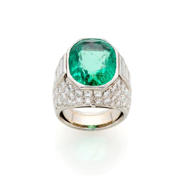 Platinum ring with emerald and diamonds