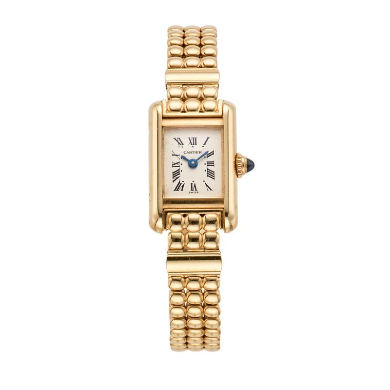 Mini Tank Louis Cartier, ref. 1446, oro giallo 18 Kt, movimento al quarzo