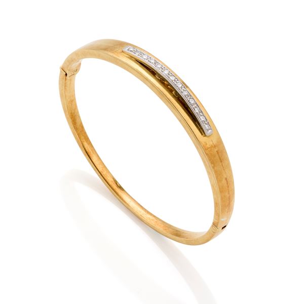 Gold bangle with diamonds