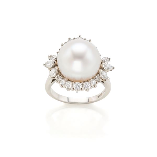 Boucheron platinum mount with pearl and diamonds