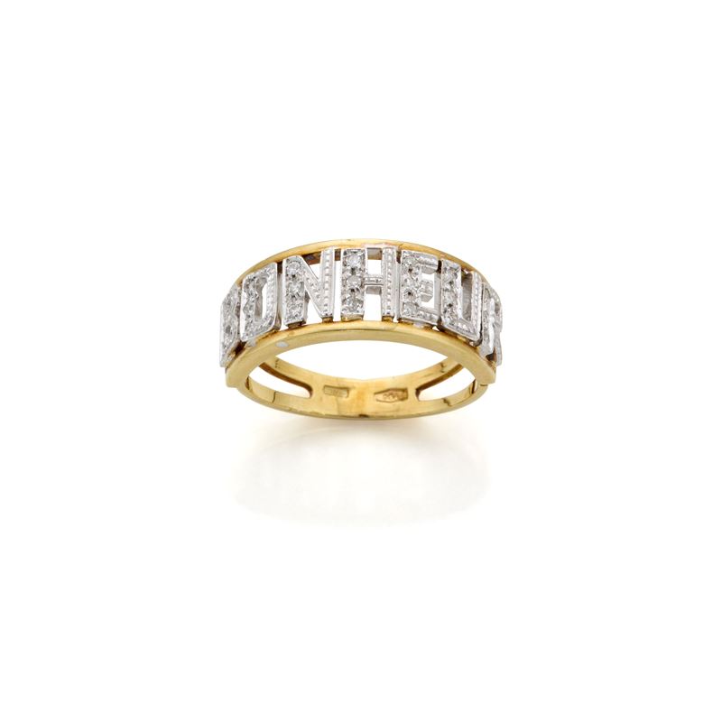 Anello in oro con scritta “Bonheur” in diamanti