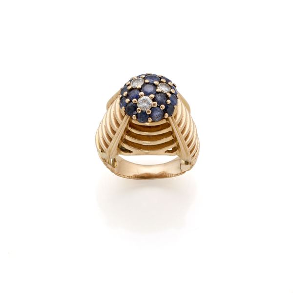 Gold ring with diamonds and sapphires