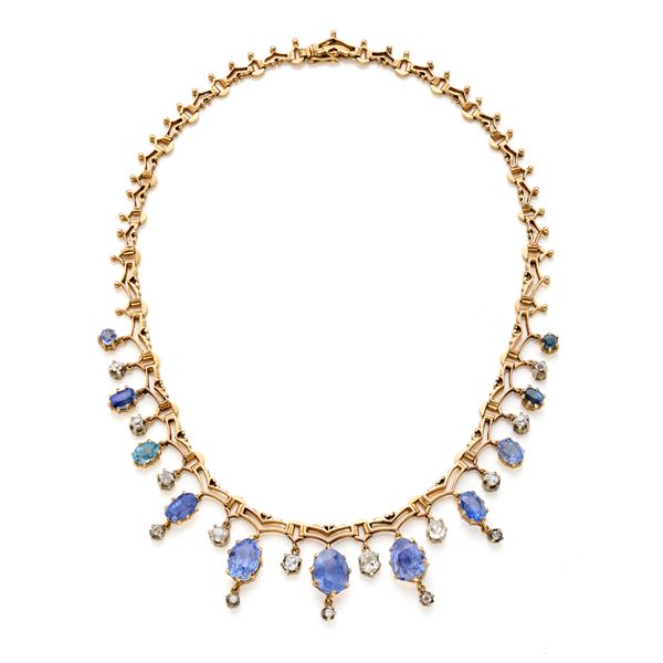Gold necklace with diamonds and sapphires