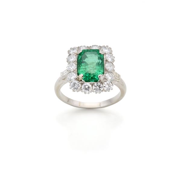 Gold ring with emerald and diamonds