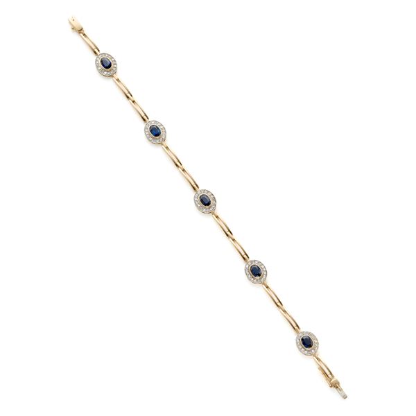 Gold bracelet with diamonds and sapphires