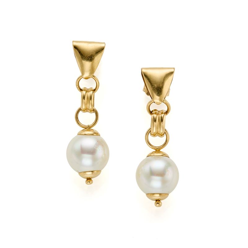 Orecchini in oro con perle