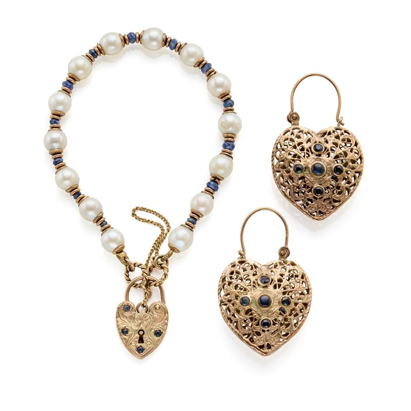 Bracciale e orecchini in oro con boules e zaffiri