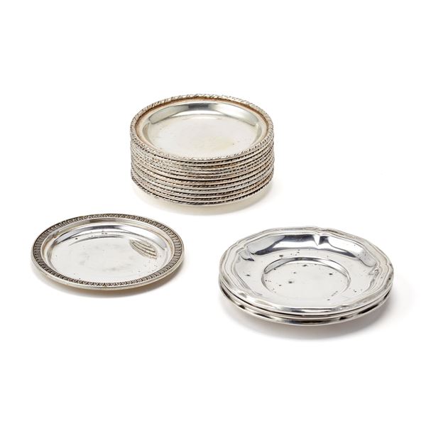 Sixteen silver small plates