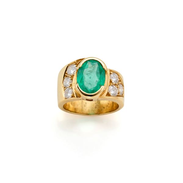 Gold ring with emerald and diamonds