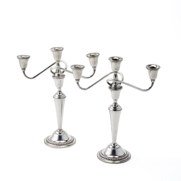 Pair of silver candelabras