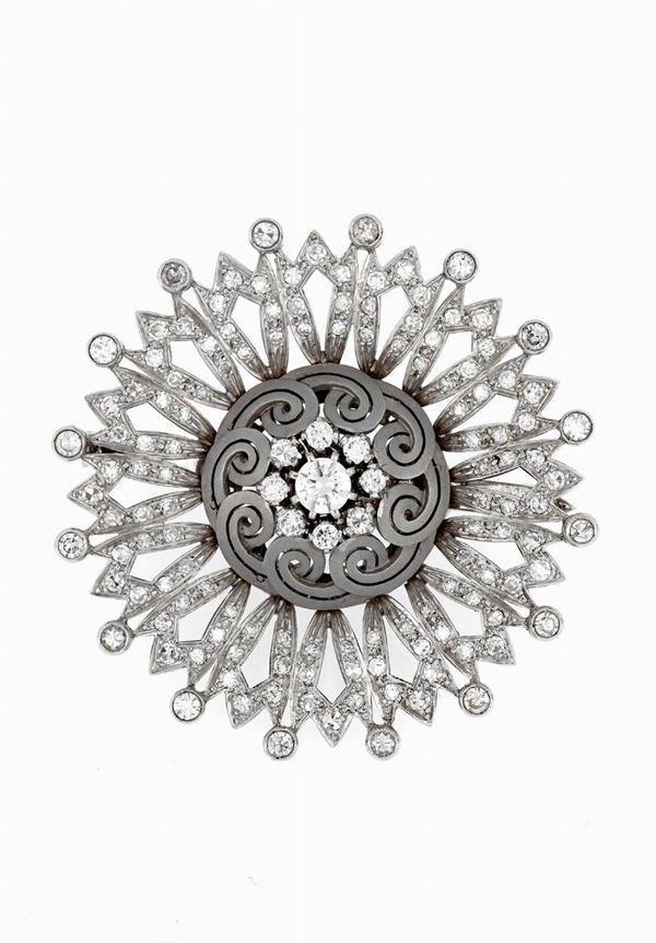 Spilla tonda in oro bianco e diamanti