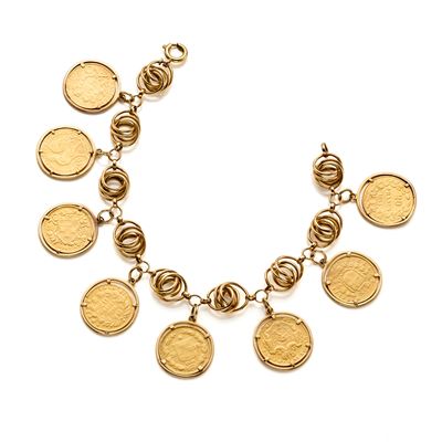 Bracciale in oro giallo 18 kt con otto monete montate a charms