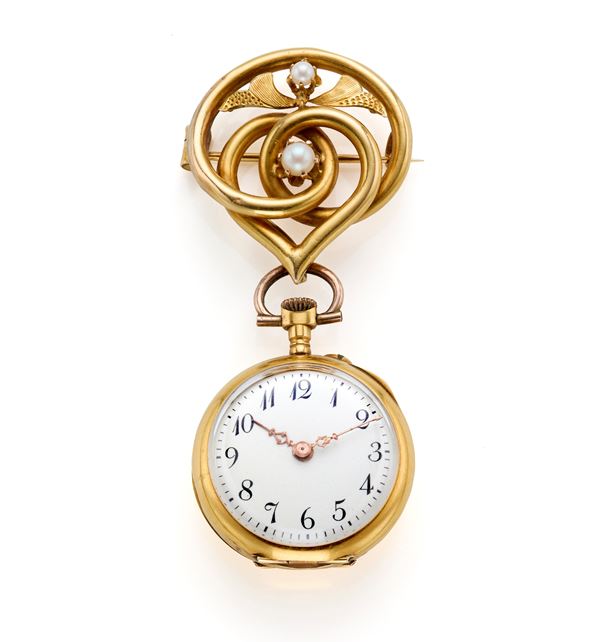 Gold pocket watch mounted with brooch 