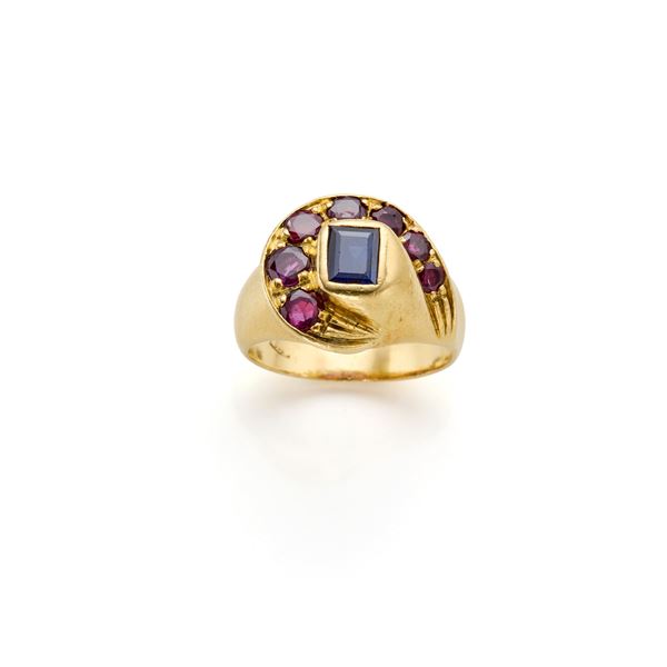 Gold ring with sapphire and rubies