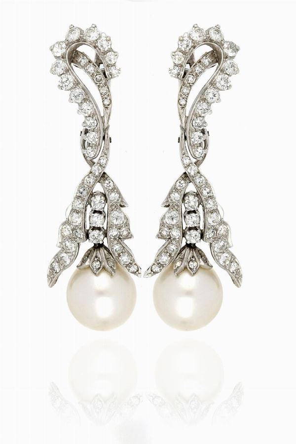 Orecchini in oro bianco, diamanti e perle
