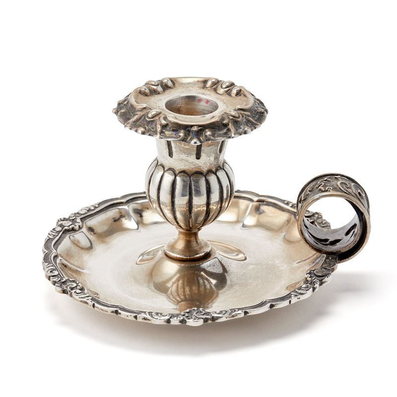 Bugia in metallo argentato firmata D. Ventrella