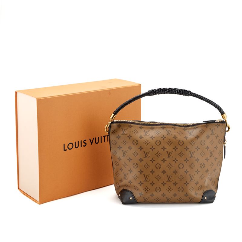 Louis Vuitton Reverso Monogram Triangle Softly
