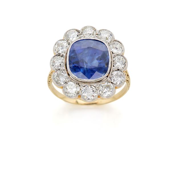 Anello in oro con diamanti e zaffiro