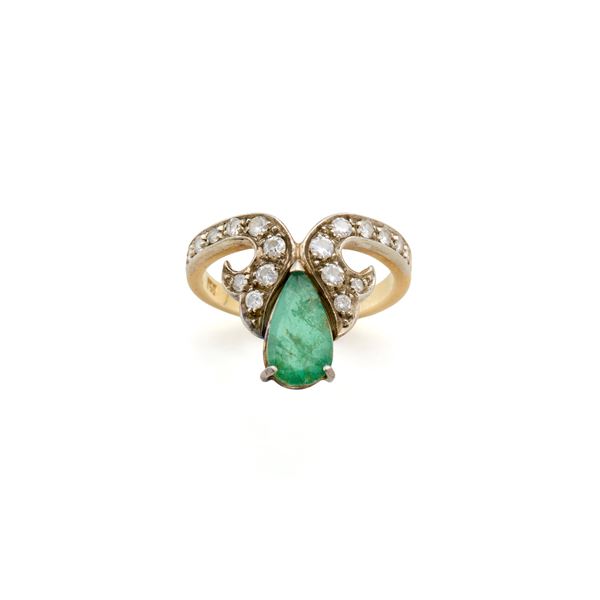 Gold ring with emerald and diamonds