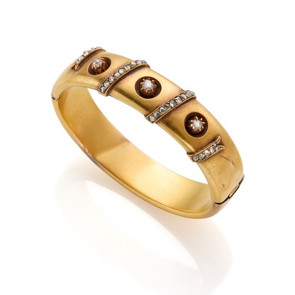 Gold bangle with diamonds