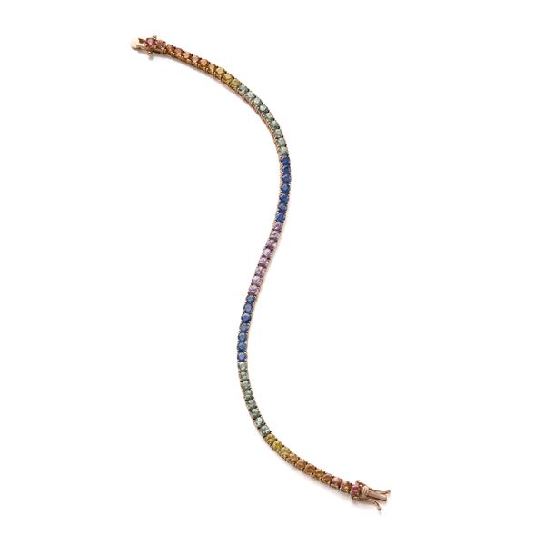 Gold tennis bracelet with sapphires