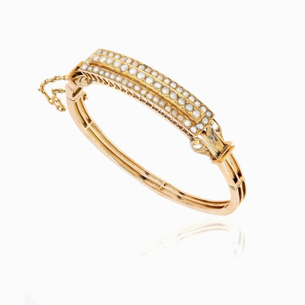 Bracciale rigido in oro e perle