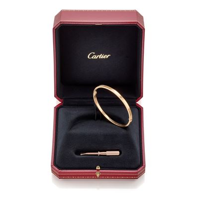 Cartier, Bracciale Love modello piccolo in oro rosa 18 kt con accessori originali