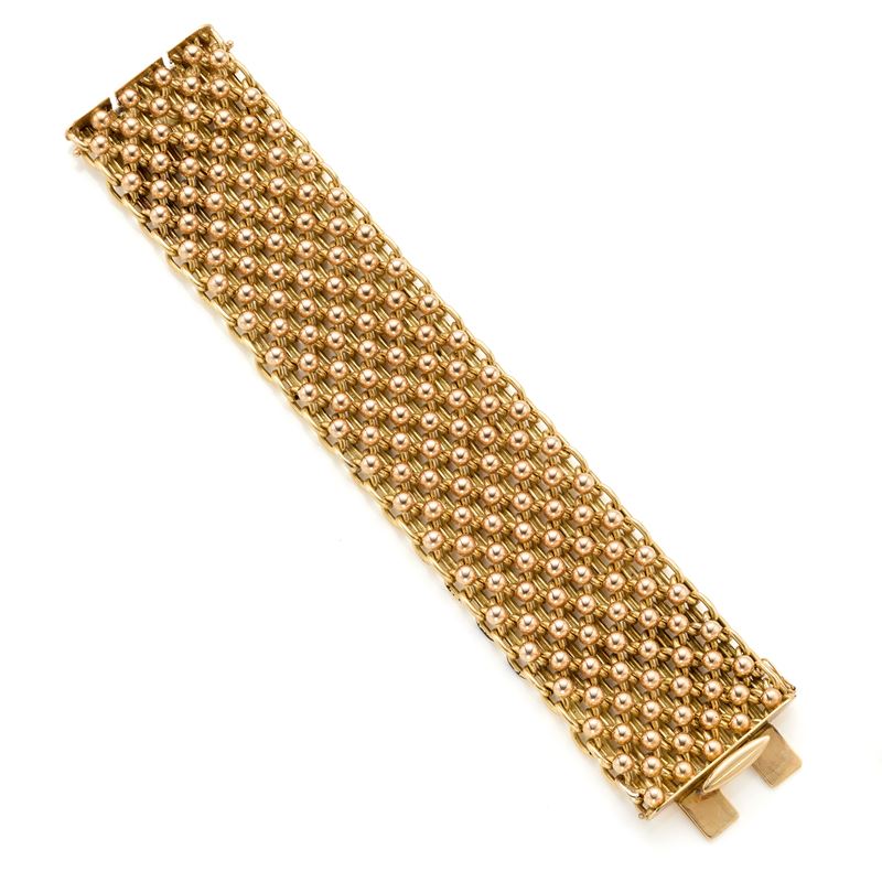 Bracciale modulare in oro 18 kt giallo e bianco, con piccole sfere