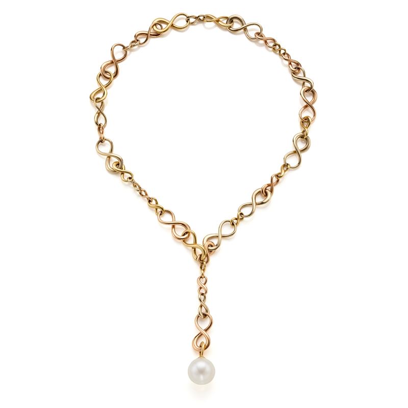 Collana in oro giallo 18 kt a catena modulare con perla bianca coltivata