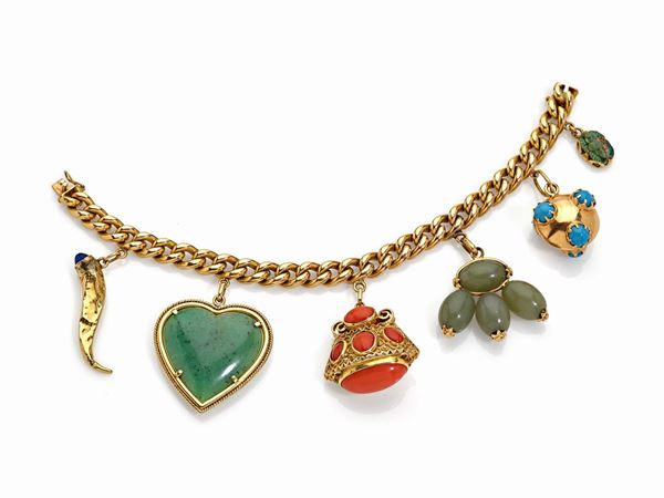 Bracciale oro e charms