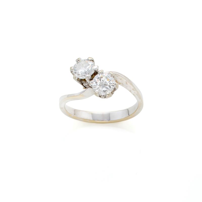 Anello contrariè in oro 18 Kt con due diamanti