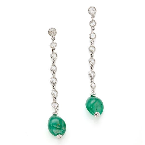 Gold earrings with diamonds and emeralds