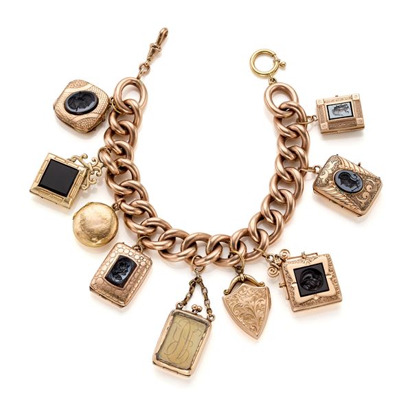 Gold bracelet with charms   - Auction JEWELS AND WATCHES - Faraone Casa d'Aste