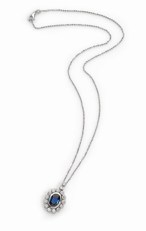 Collana in oro bianco con zaffiro e diamanti