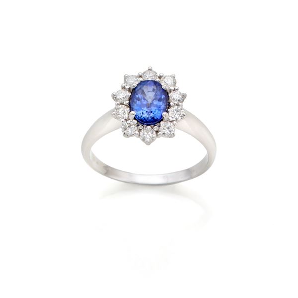 Gold ring with a sapphire and diamonds  - Auction JEWELS AND WATCHES - Faraone Casa d'Aste