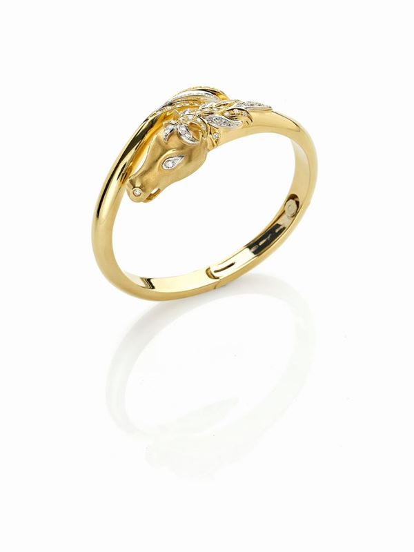 Bracciale rigido in oro giallo e diamanti  - Auction Gioielli e Orologi del XX Secolo - Faraone Casa d'Aste